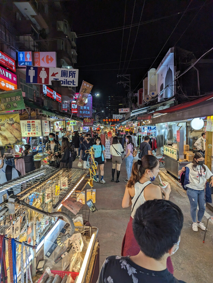 People doing their thing at night markets