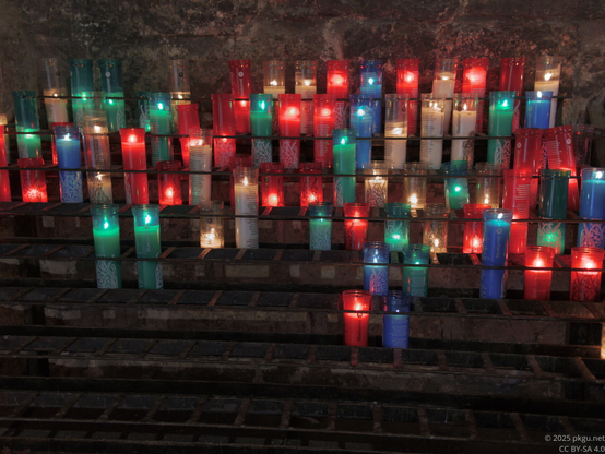 Candles in Santa Maria de Montserrat Abbey, Catalonia, Spain.