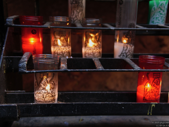 Candles in Santa Maria de Montserrat Abbey, Catalonia, Spain.