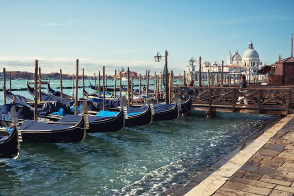 Venice gondolas parked in a sunny day