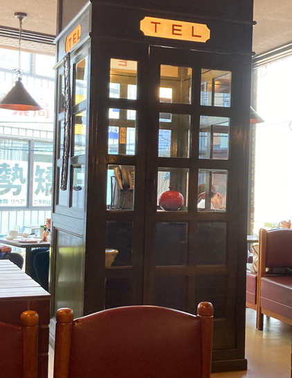 The telephone box in the coffee shop