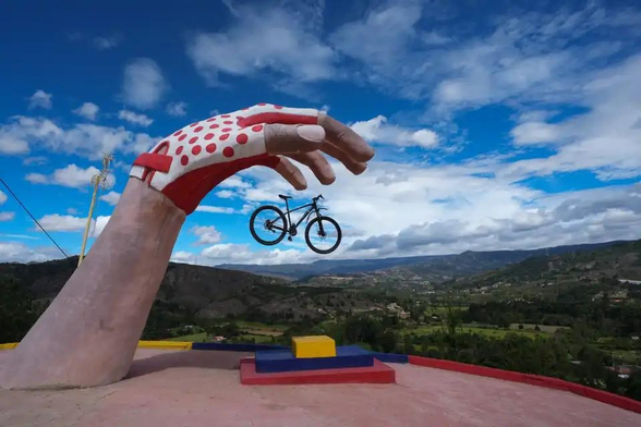 The World’s Largest Bicycle rises as a powerful tribute to Colombia’s cycling soul in the rolling highlands of Tinjaca, Boyaca, Colombia on June 4, 2025. The monumental sculpture weaves local pride with the legacy of a country that lives and breathes cycling. 📸 Juancho Torres/Anadolu Images