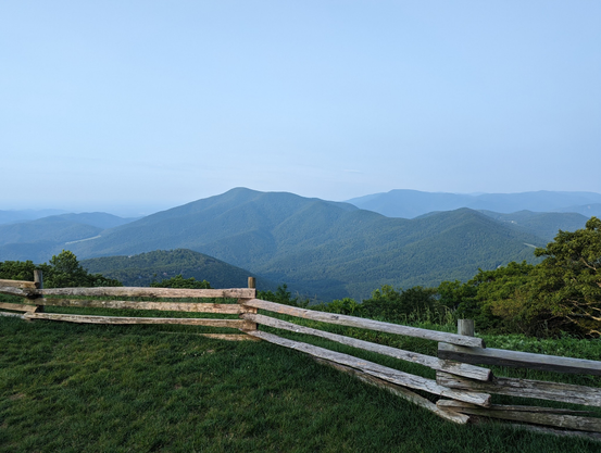 The Blue Ridge mountains on a hazy morning from the Three Ridges Overlook at Wintergreen, VA. Taken while out for a hilly morning run.