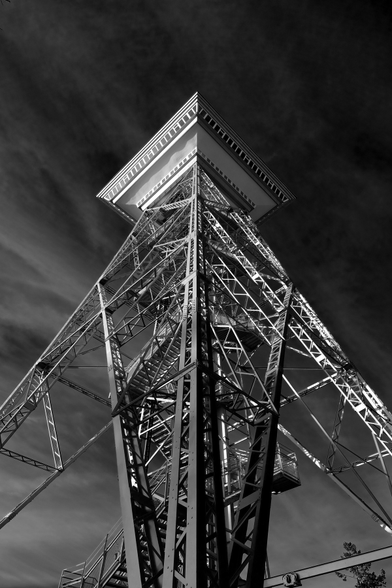 A large steel framework broadcasting tower, seen from the ground.