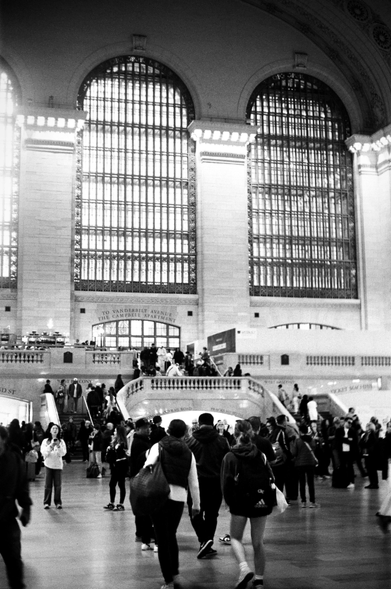 Grand Central Terminal, 2025-05-23, around 5pm.

Camera: Canonflex 35mm SLR. Lens: 50mm f/1.8. Film: Tri-X 400. Exposure: 1/30 at f/2. N+2 development. Process/scan The Darkroom Lab.
