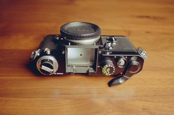 Nikon camera on a wooden table
