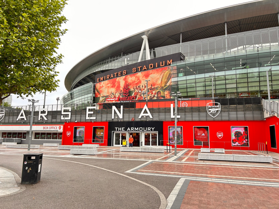 Emirates Stadium view of swag store. Litter can has been moved onto ring road.
