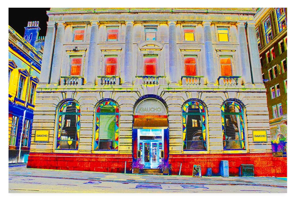 Colour adjusted photograph (overly colourful with a black sky) showing a Georgian listed building which is now a restaurant.