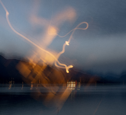 A blurry picture of something or other with swirls of light.