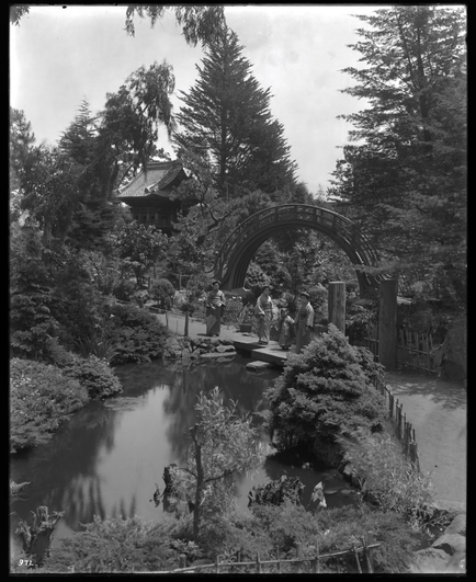 Japanese Tea Garden with people standing in front of pond