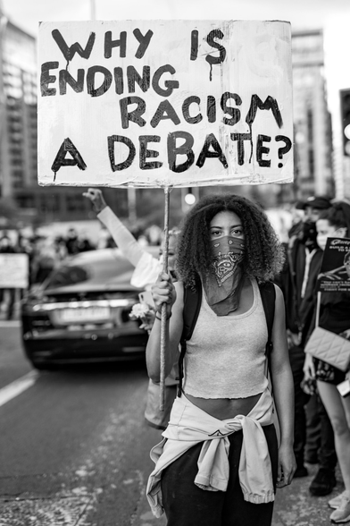 Misan Harriman's viral image "Why Is Ending Racism a Debate" i