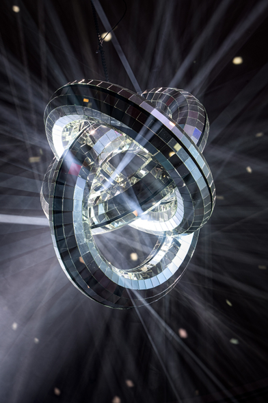 Three mirrored rings light installation in the entrance hall of CCH
