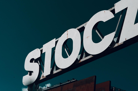 Part of a signage that says "Stocznia" in Gdansk shipyard