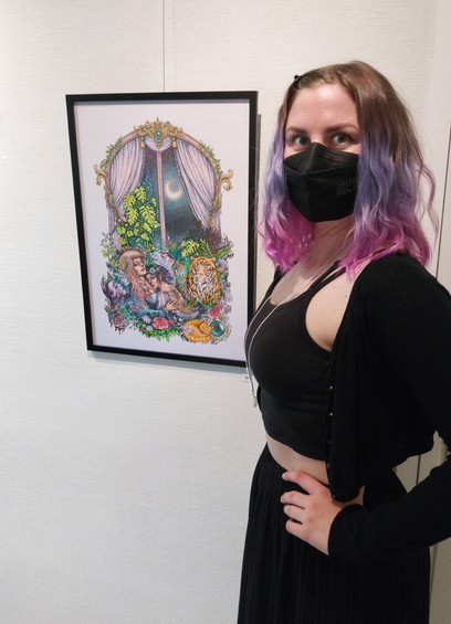 The artist (me) posing in front of the original painting in an art gallery