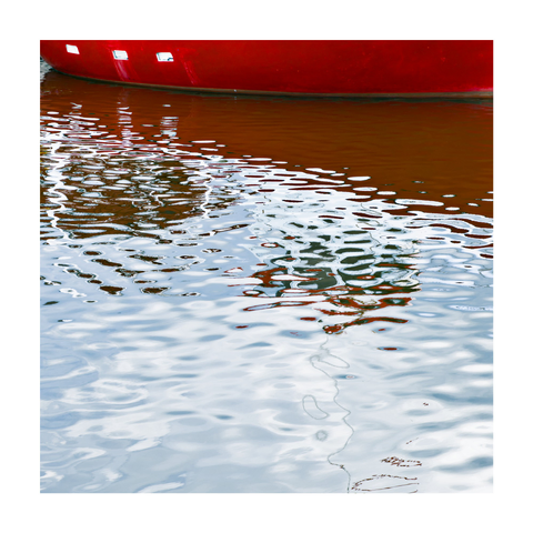 A square color photograph showing the reflection of a red ship hull and other structures in rippling water. The upper part of the image contains the curved red side of the boat near the top edge. The majority of the frame is filled with the distorted reflection on the water’s surface, with patterns of white, black, red, and light blue tones. The image captures the texture and movement of the water in a visually abstract manner.

I'm not sure whether the three white openings on the boat are actually windows, otherwise I would have tagged it with #FensterFreitag