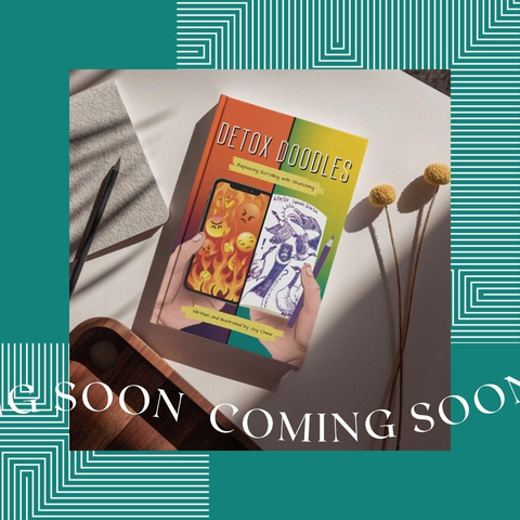 A teal square with some white geometric designs on the top right and bottom left. There is the text in a wave "Coming Soon" repeating along the bottom. The square photo in the middle is a mockup of the book Joy has been working on, Detox Doodles: Replacing Scrolling with Sketching. The mocked up book is placed next to some paper, a pencil, some dried plants and a wooden tray on a desk.