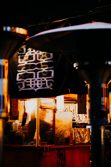 photo of a restaurant scene with some person standing behind foggy window looking like a very humid surroundings