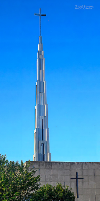 The 160 foot tall steeple of the mid-century modern Saint Bonifice Church which is now closed to a merger with another Parish.  It is a classic example of the architect John Benya who designed multiple mid-century modern structures in Illinois, Missouri, and across the US.