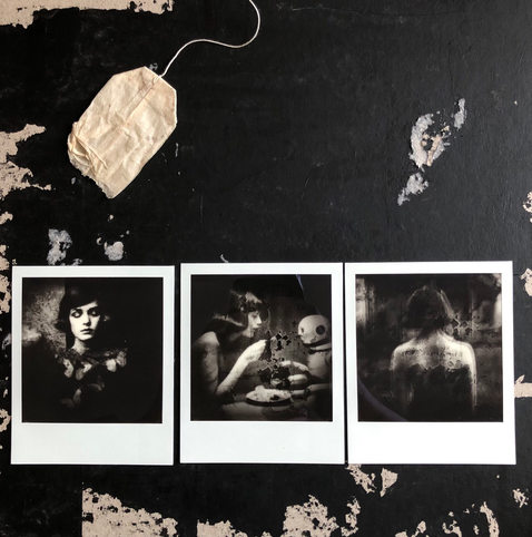 Triptych of Polaroids on a black cardboard with an empty teabag. All polaroids showing a woman. 