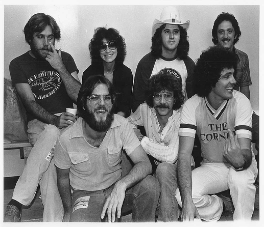 black and white promo still of the band group shot.