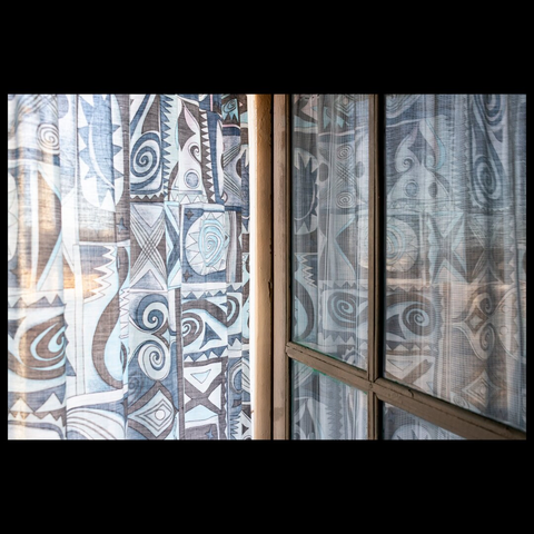 Detail of the reflection in the glass of a door.
