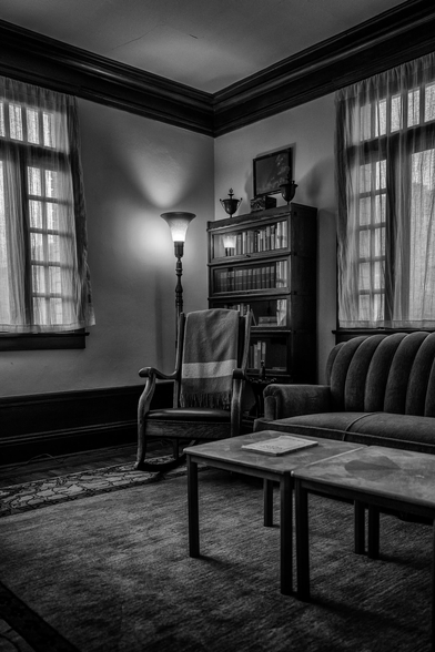 Corner of a living room in a small apartment in San Francisco. It is furnished to look like a flat from the late 1920s.