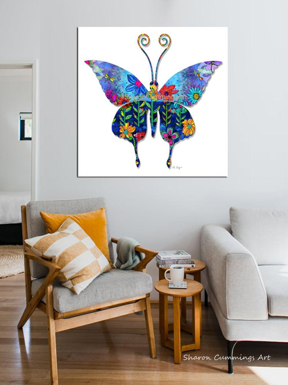 Colorful butterfly with flowers and mandala by artist Sharon Cummings.