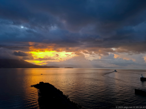Sunset on the sea with Sakurajima, Kagoshima, Japan.
