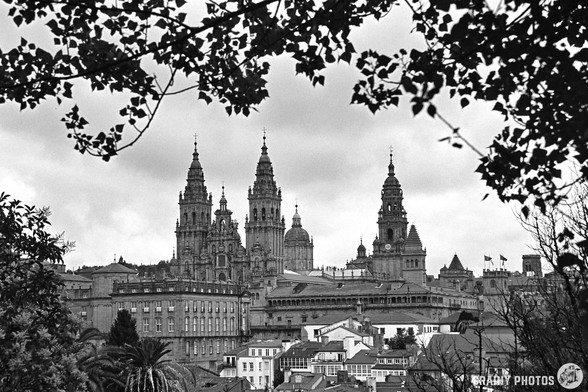 A black-and-white film photo of the Santiago de Compostela⁩ cathedral