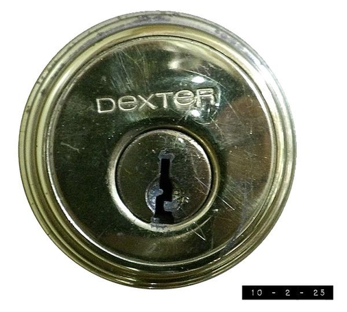 The deadbolt lock on my garage door.  It's about 2" in diameter.  And it suddenly makes me wonder: Are there livebolt locks?  Do I have any that I don't know about?  Is THAT what I hear softy breathing in the night??  Might be time for a home inspection!  