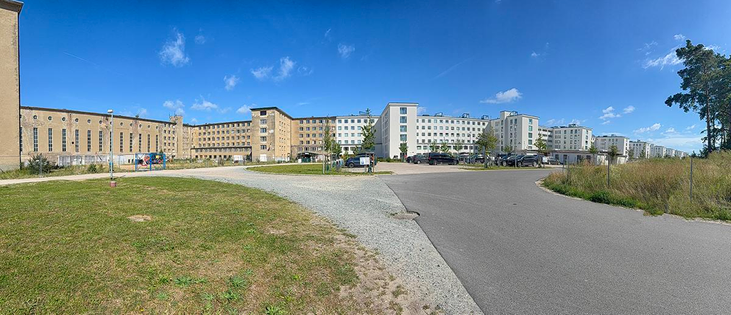 Colossus of Prora, the longest building in the world, Bad Prora, Binz, Rügen Island, Baltic coast

Planned for 20,000 guests, Hitler's monumental holiday camp complex on Rügen is a bizarre remnant.
It was built on the orders of Adolf Hitler in the 1930s, according to the designs of a Nazi architect, Clemens Klotz. The manic aim: 20,000 people at a time were to vacation in the nearly five kilometer-long (3.1 mi) holiday camp, arranged by the Nazi "Kraft durch Freude" (Strength through Joy) organization. Its mission was to control and bring into line the German population's leisure time. All 10,000 rooms were to have a sea view, which explains the gigantic length of the structure

When the regime instigated the Second World War in 1939, construction was discontinued. The complex was never completed. No KdF tourist ever vacationed in the "seaside resort for twenty thousand". Instead, the housing blocks, which were shells, were used militarily — as barracks, for instance, first under the Nazi regime, and then in communist East Germany, the GDR. After the Berlin Wall fell and Germany was reunited, the complex was officially historically listed. Museums and artists' studios moved in, but large sections of the monstrous structure, considered the longest of its kind in the world, decayed.