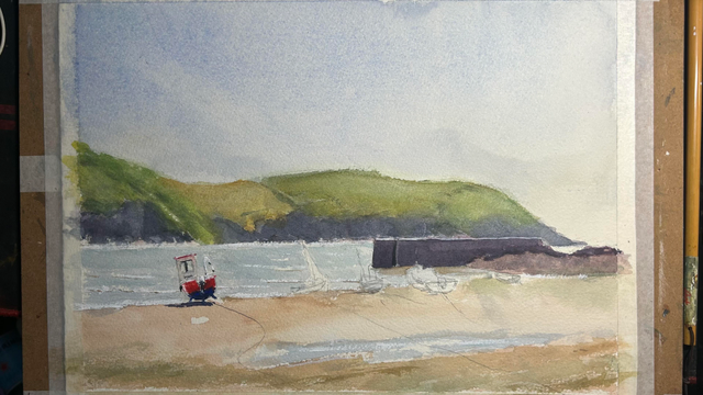 A watercolor painting depicting a coastal scene. The foreground features a small boat on sandy shore, with a few boats on the beach. The background includes rolling green hills under a light blue sky.