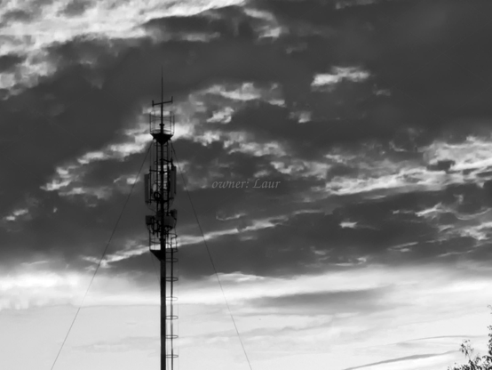 Clouds, radio tower, black and white, photo