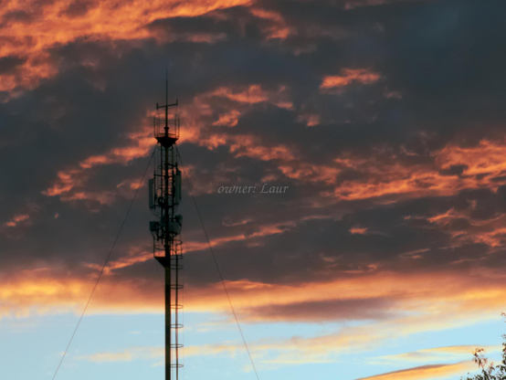 Clouds, radio tower, color, photo