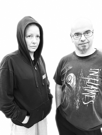 A woman and man. Used iPhone 13.