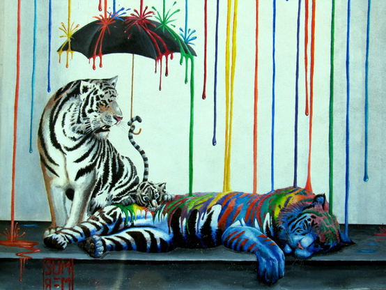 The image is a digital painting featuring a large tiger and a smaller tiger lying on a black surface. The larger tiger is sitting upright, while the smaller tiger is lying on its side with its head resting on its paws. Both tigers are painted in vibrant, colorful patterns, with a mix of blues, greens, yellows, and purples. Behind the tigers is a stylized, dripping rain effect with a range of colors including reds, oranges, yellows, greens, blues, and purples. The words "SUM" and "111" are written in white on the black surface beneath the tigers.