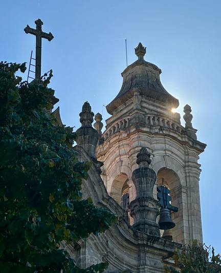 Sun peeking through Braga church steeple