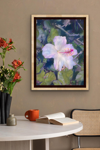 Framed art shown in a display room.