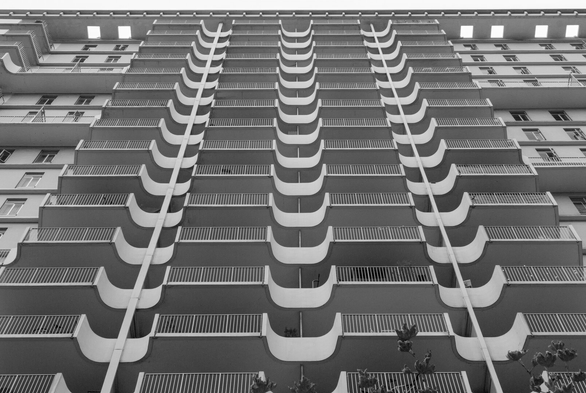 A black and white image of row after row of balconies