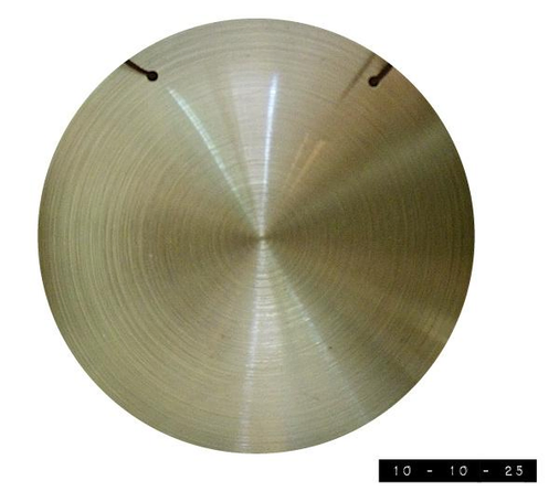 Metal gong.  Although it's only 5" in diameter, striking it once sure scares the hell out of the pigeons.  (Not that I ever intend to do that, mind you.  I just sometimes miss the cup when I grab a spoon and try to stir my coffee in the morning.)      