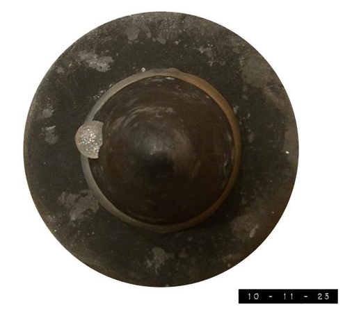 Top view of a special Halloween decoration that's been in my family now for many months.  Close examination reveals that there are several outstanding inches in its height and more than a few good looking centimeters in its width.  In fact, I'd be tempted to marry it if that sort of thing was legal in my state.  As it is, well, if living in sin was good enough for my mother and her favorite ceramic Christmas elf, it's good enough for me!    