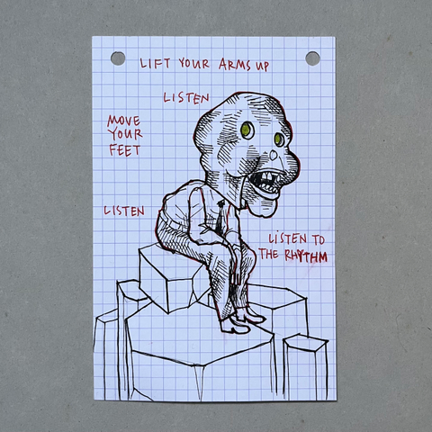 A series of four drawings on  index card. Each one is showing a man on the top of a cliff. He’s wearing an oversized mask that looks like a ventriloquist’s puppet, dressed with a white shirt and a black tie. He’s alone, surrounded by what seems to be instructions to dance : Shake your shoulders, lift your arms up, move your feet, tap your feet clench your teeth, turning in circles, let’s go