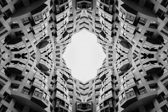 An abstract symmetrical black and white modern architecture photo.