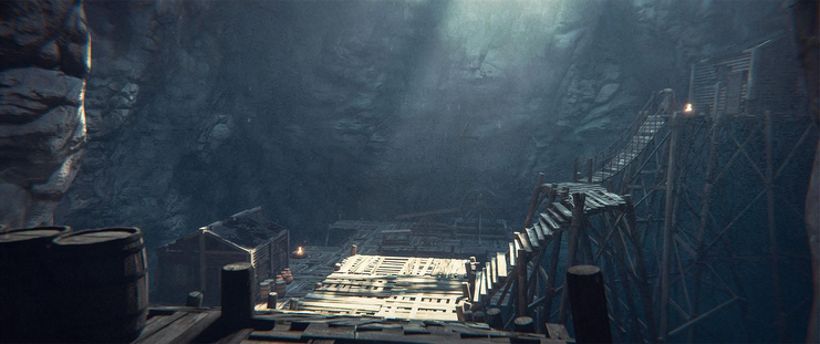 A series of wooden platforms, stairs and walkways built inside a vertical cave, with sunlight streaming down from above.