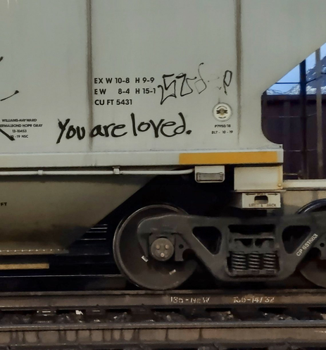 Train car with graffiti rolling through Kamloops BC Canada