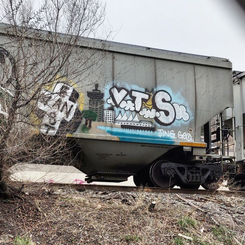 Train car with graffiti rolling through Kamloops BC Canada