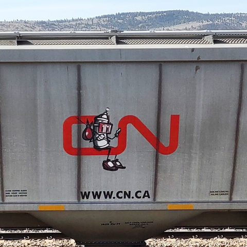 Train car with graffiti rolling through Kamloops BC Canada