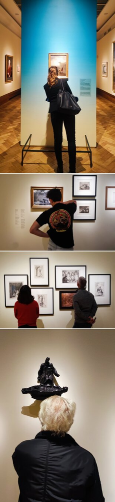 Pictures of people looking at art