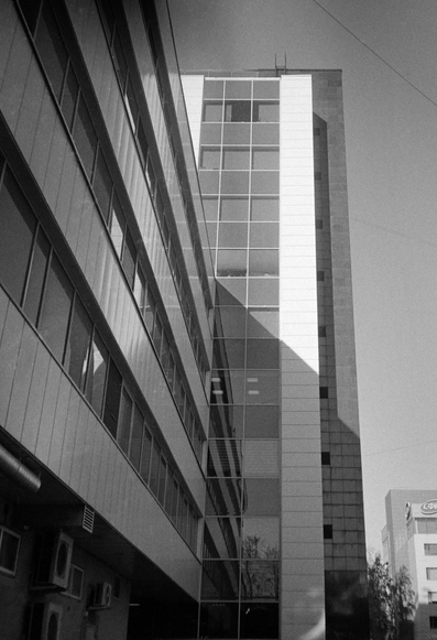 A modern building in a black-and-white photograph.