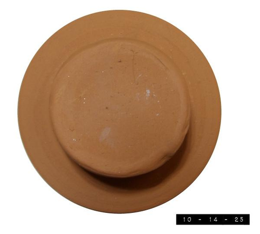 Clay top hat for a clay pot jack-o'-lantern that's sitting on my patio table tonight keeping the ghosts and goblins at bay.  It's doing such a good job that I'm thinking about putting it by my front door so it can keep the scary bill collectors at bay all year long.  Hat is 7 inches in diameter and 3 inches high.  My stack of bills might be somewhat larger!  